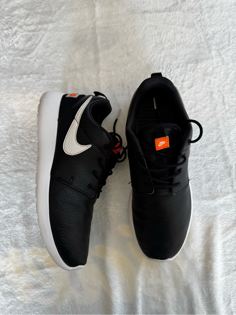 Nike Black Athletic Sneakers with White Swoosh and White Sole